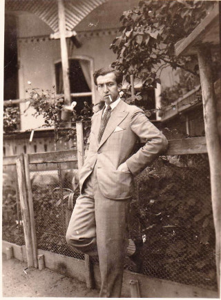 László Balázs, merchant and soldier in front of the family home in 1931